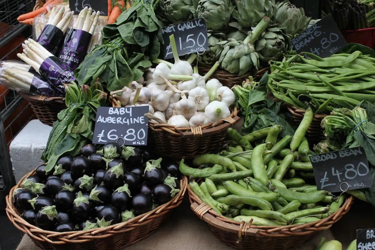 Baskets of vegetables at a market stall